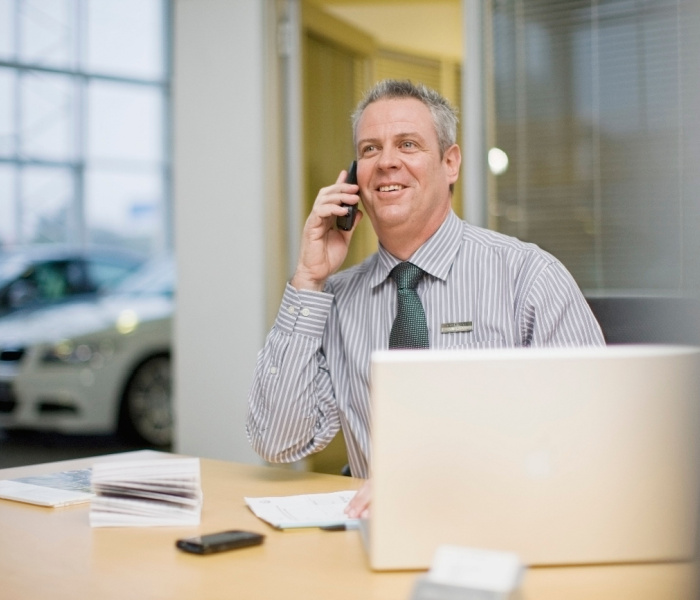 Business owner reviewing marketing plan and performance