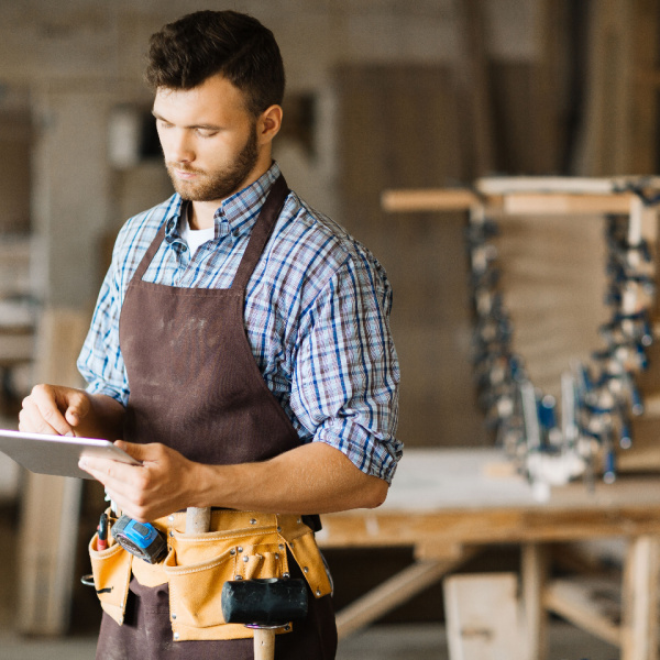 Home service business owner reviewing operations and planning growth strategy